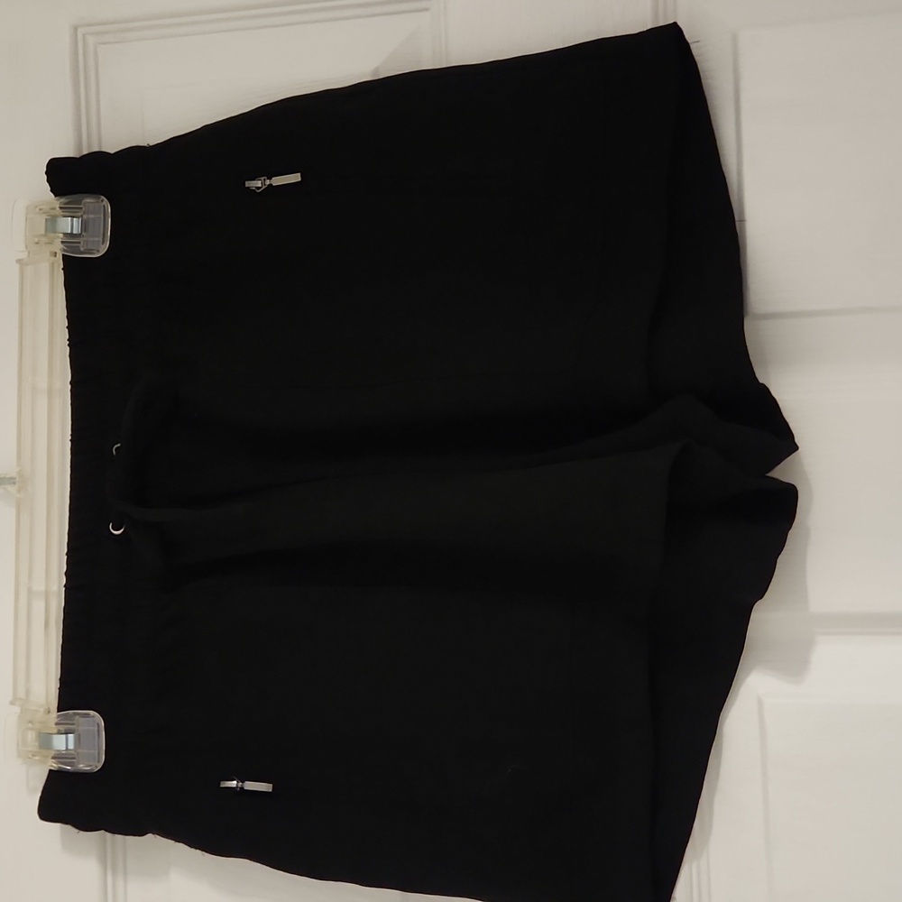 Black drawstring flowy shorts